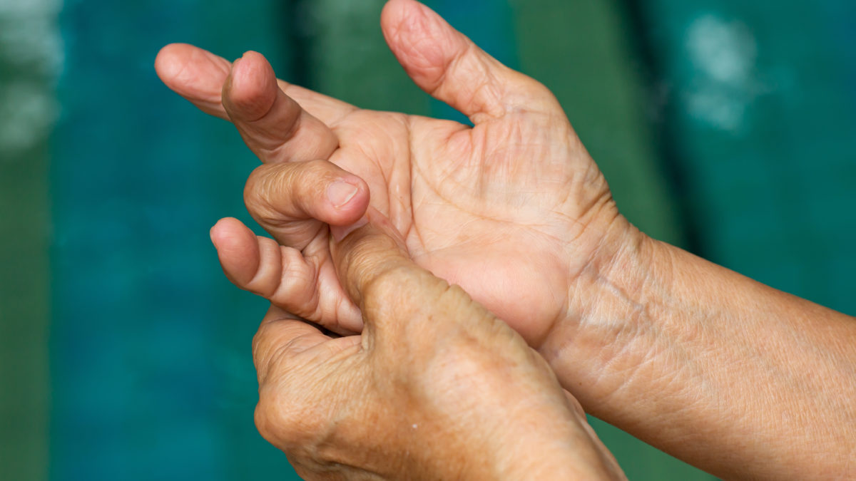 Female massaging her trigger finger